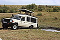 Safari vehicle stuck in mud