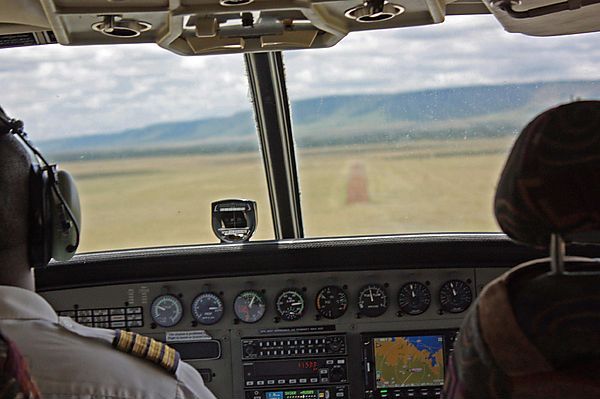 Coming Into Land On A Dirt Airstrip In The Masai Mara