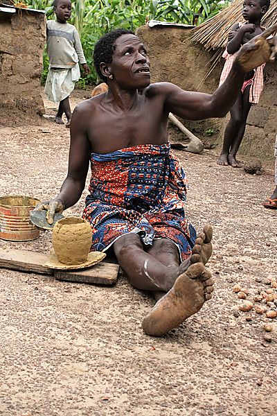 Woman making beer pots to sell at market