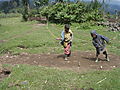 Children Playing With A "whipping Top"