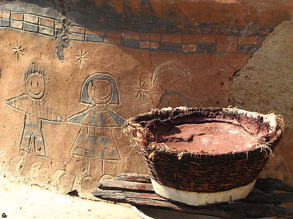 Millet Beer Brewing Alongside House Designs In Tiébelé.